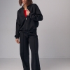 Трикотажный женский костюм с бомбером и прямыми штанами  LX-10564509