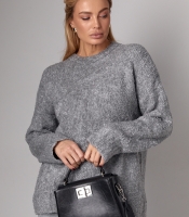 Жіночий подовжений в'язаний джемпер oversize