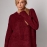 Жіночий подовжений в'язаний джемпер oversize