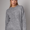 Жіночий подовжений в'язаний джемпер oversize  LX-10614210