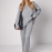 Жіночий костюм oversize у рубчик зі штанами палаццо