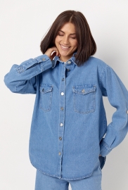 Жіноча джинсова сорочка на ґудзиках Жіноча джинсова сорочка на ґудзиках