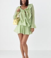 Літній костюм зі спідницею і блузою з рюшами