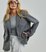 Класичний жіночий піджак із англійським коміром