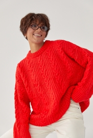 В'язана жіноча кофта в косички В'язана жіноча кофта в косички