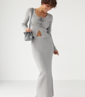 Приталений костюм в рубчик з кофти та спідниці