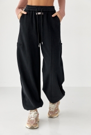 Однотонні теплі спортивні штани із затяжками внизу Однотонні теплі спортивні штани із затяжками внизу