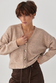 В'язаний кардиган на ґудзиках з V-подібним вирізом