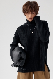 В'язана туніка в рубчик із високою горловиною В'язана туніка в рубчик із високою горловиною