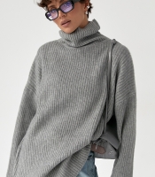 Тепла в'язана туніка в рубчик