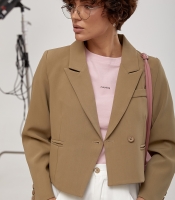 Короткий класичний жакет з асиметричним низом