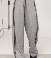 Широкі спортивні штани з лампасами