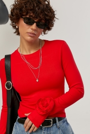 Однотонний лонг з трояндами на рукавах