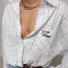 Сорочка в клітинку з вишитим написом на кишені  LX-10737223