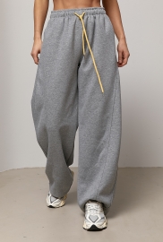 Однотонні спортивні штани із затяжками Однотонні спортивні штани із затяжками