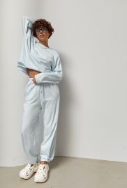 Трикотажний однотонний костюм із лонгом та штанами палаццо