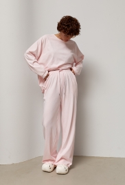 Трикотажний однотонний костюм із лонгом та штанами палаццо