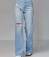 Жіночі джинси з рваними елементами