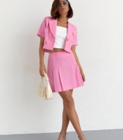 Костюм зі спідницею плісе і коротким жакетом