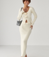 Приталений костюм в рубчик з кофти та спідниці