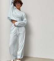 Трикотажний однотонний костюм із лонгом та штанами палаццо