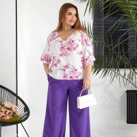 Костюм женский с блузой из штапеля в цветочный принт и широкими брюками из тиара весенне-летний