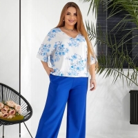 Костюм женский с блузой из штапеля в цветочный принт и широкими брюками из тиара весенне-летний