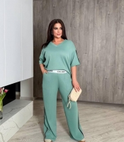 Костюм женский свободного кроя из трикотажа вафелька с V-образным вырезом и эластичным поясом весенний летний