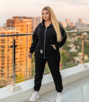 Спортивный костюм женский черный из трехнитки на флисе с вставками из экокожи с худи на молнии и брюками осенний