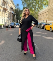 Костюм-двойка женский из креп-дайвинга с блузой на запах и асимметричным низом и прямыми брюками осенний