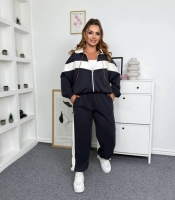 Спортивный костюм-двойка женский из трикотажа пума с контрастными вставками и курткой на молнии осенний