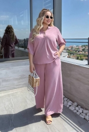 Костюм-двойка женский из крепа жатка с свободной блузой и широкими брюками летний