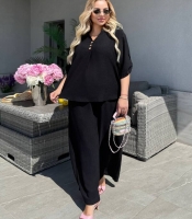 Костюм-двойка женский из крепа жатка с свободной блузой и широкими брюками летний