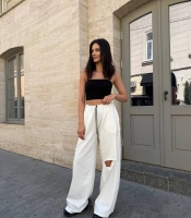 Брюки женские хлопковые из кулира прямые широкие на резинке с разрезом на колене весенне-летние