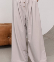 Брюки женские палаццо из тиара прямые широкие с высокой посадкой на резинке с декоративными пуговицами и карманами весенне-летние