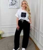 Костюм женский из льна и крепа с футболкой свободного кроя и широкими брюками летний