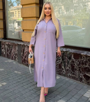 Платье рубашка женское из льна жатки свободного прямого кроя с отложным воротником пуговицами накладными карманами и высокими боковыми разрезами больших размеров