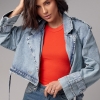 Коротка жіноча джинсовка у стилі Grunge lx-2043 Коротка жіноча джинсовка у стилі Grunge lx-2043