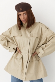 Подовжена жіноча вітрова куртка Подовжена жіноча вітрова куртка