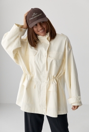 Подовжена жіноча вітрова куртка Подовжена жіноча вітрова куртка