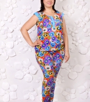 Костюм-двойка женский из штапеля с вискозой и хлопком: блуза на пуговицах и зауженные брюки с рисунком летний