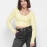 Вязаный желтый топ с длинными рукавами 43340