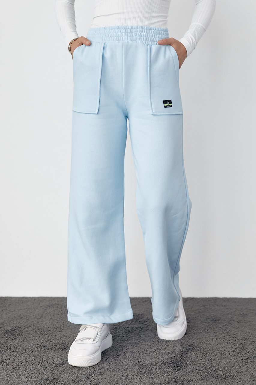 Трикотажные штаны на флисе с накладными карманами