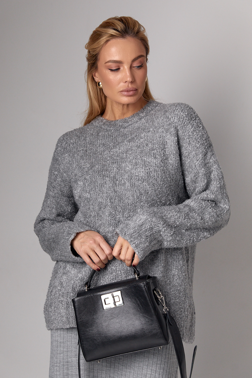 Жіночий подовжений в'язаний джемпер oversize