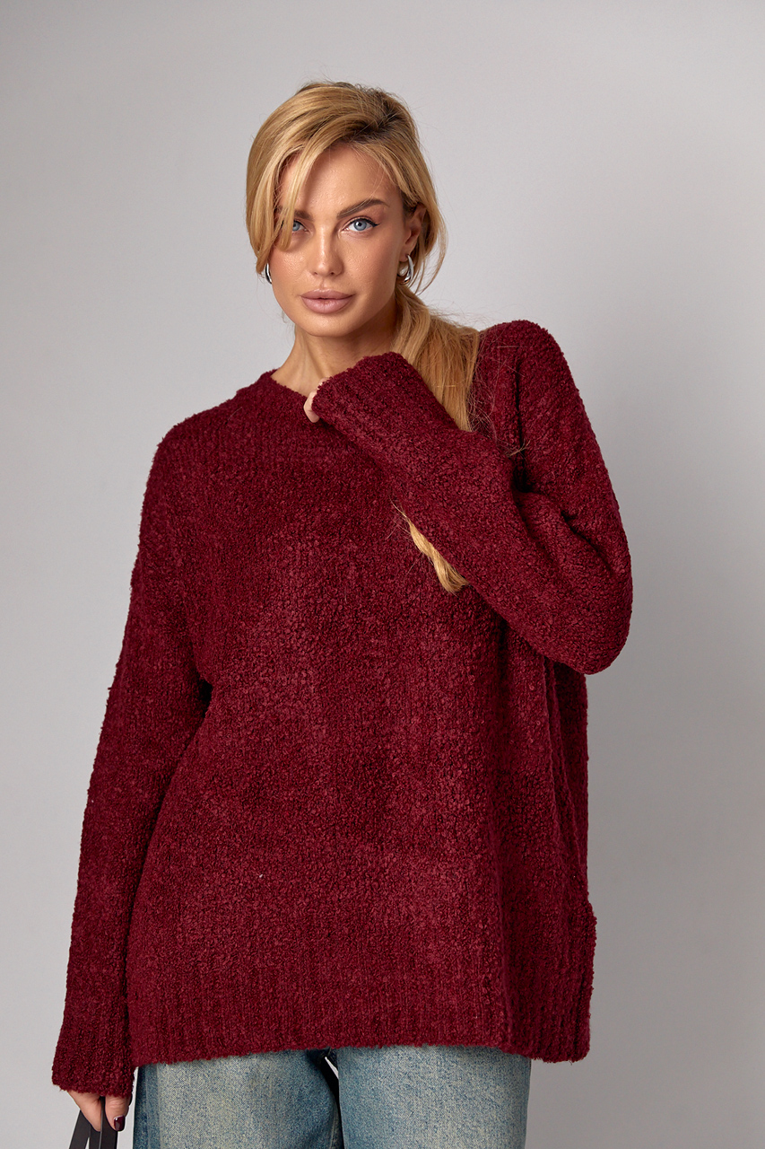 Жіночий подовжений в'язаний джемпер oversize