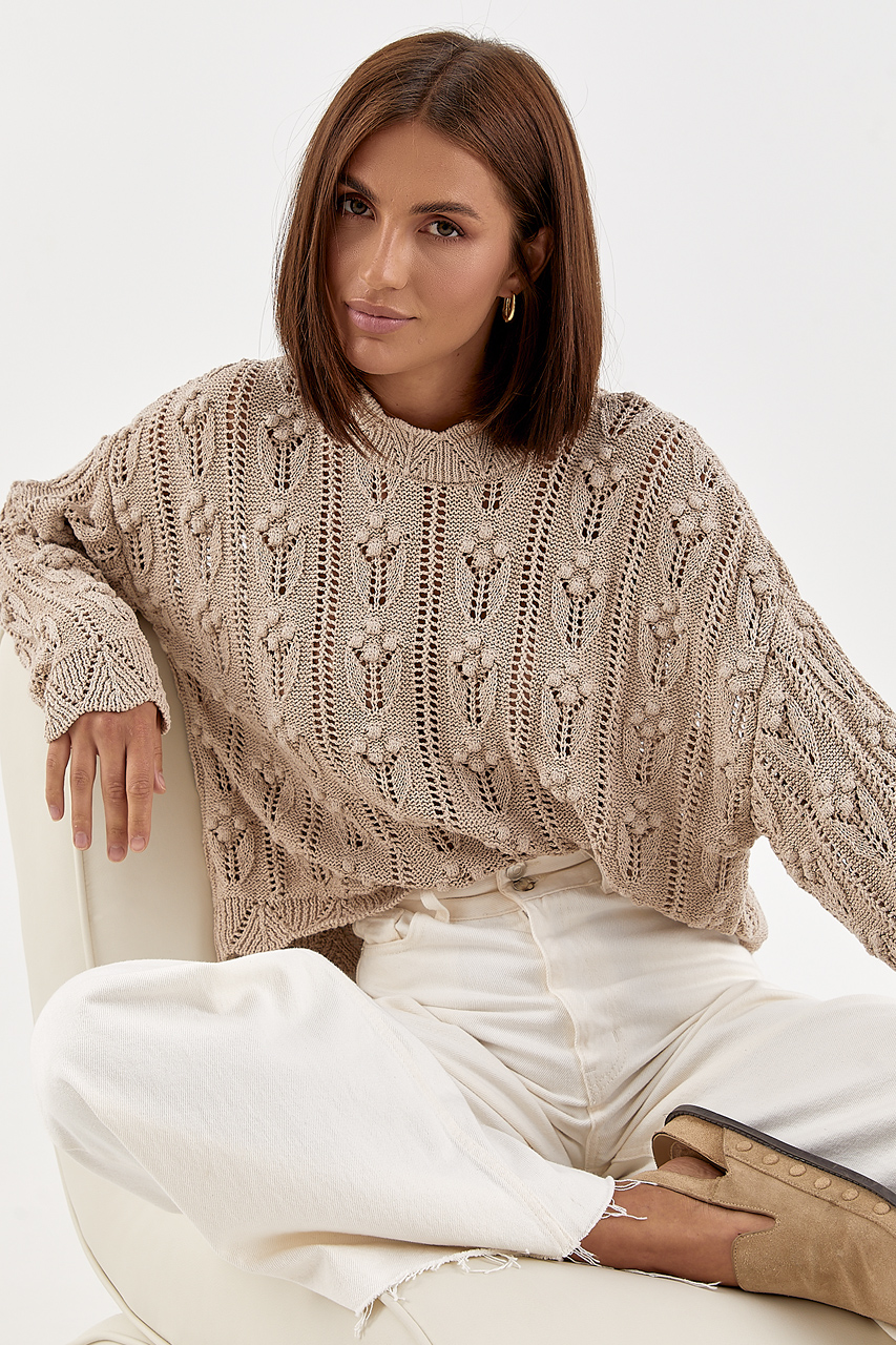 Жіночий светр з ажурної в'язки