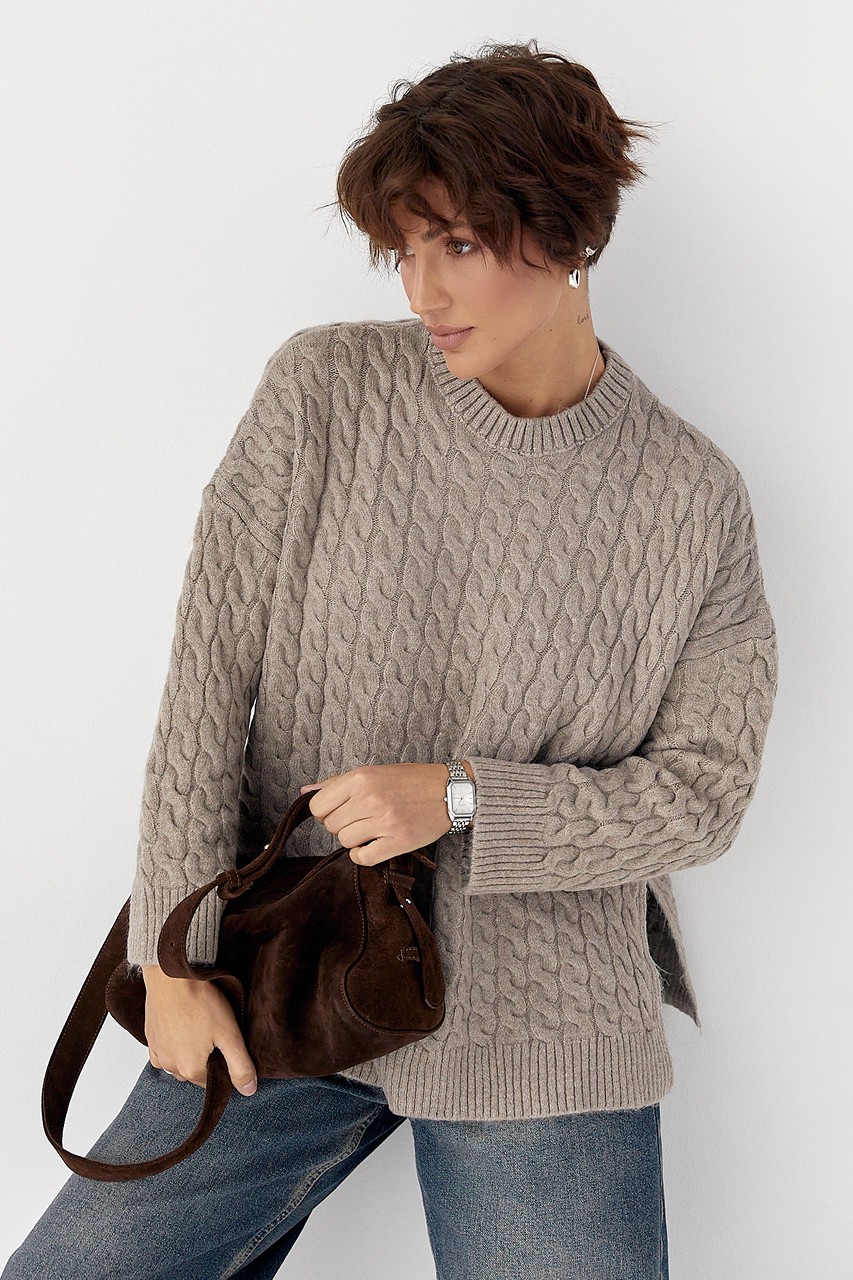 В'язана туніка з косичками