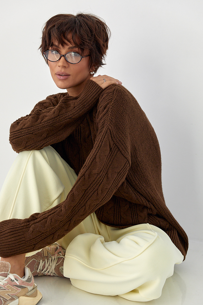 Вільна в'язана кофта в косички