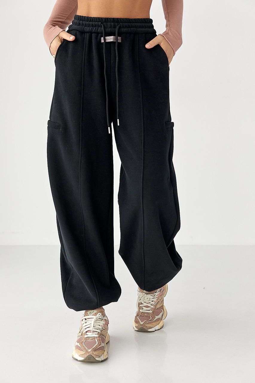 Однотонні теплі спортивні штани із затяжками внизу LX-10710809 Однотонні теплі спортивні штани із затяжками внизу LX-10710809