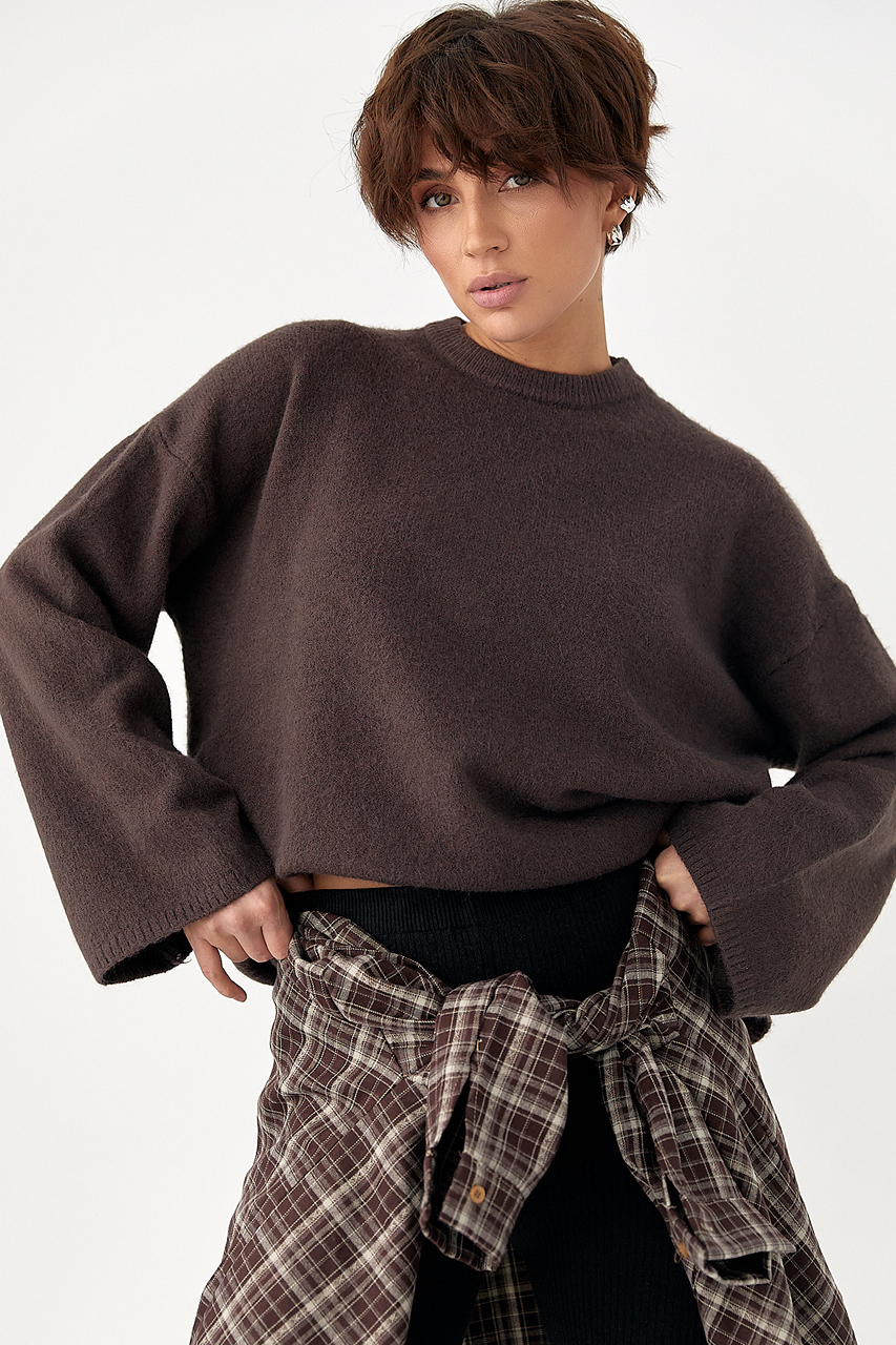 В'язана однотонна кофта з широкими рукавами